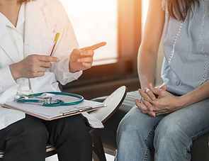 Nurse talking to a patient about test results