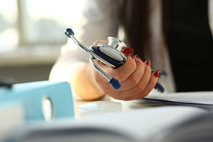 Nurse holding stethoscope
