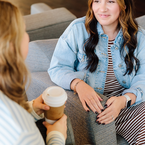 covenant care adoption counselor meeting with woman over coffee