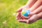 World environment day concept. A mother's hand embrace her little daughter's hands. Child