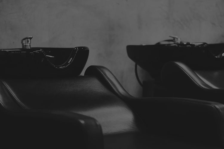 black sunglasses on black leather chair_edited_edited.jpg