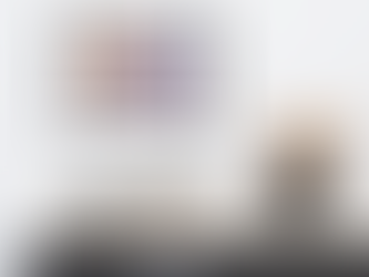 A framed, horizontal art print featuring abstract swirls in vibrant, holographic colours.