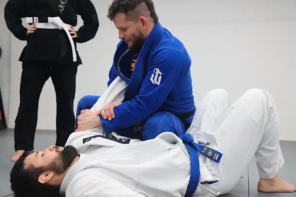 Adult beginners learning BJJ techniques at Liberdade Jiu Jitsu in Nashville
