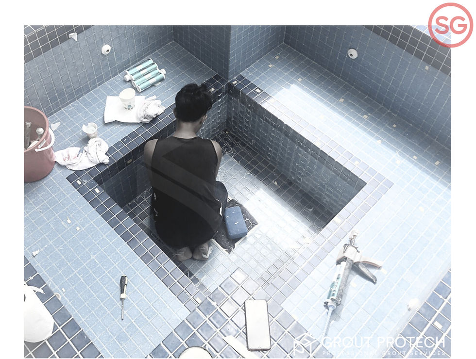 Grout_ProTech_worker_applying_waterproof_grout_to_a_pool_edited