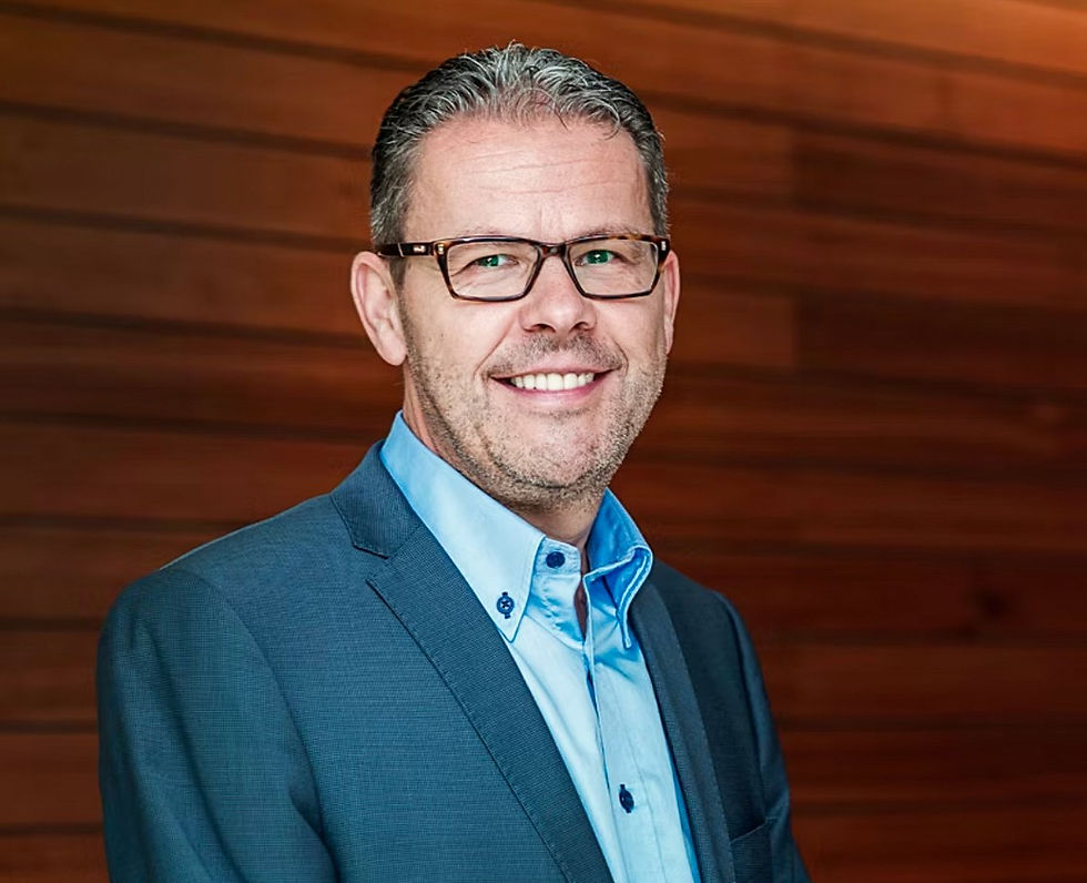 Jaroslav Kouril, Country HR Director at Faurecia Slovakia, photographed for the MENITY Leaders Talk series, discussing automotive industry challenges, workforce development, and talent management.