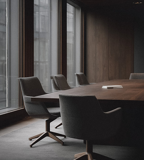 Empty boardroom prepared for a confidential CEO succession and Board transition discussion.