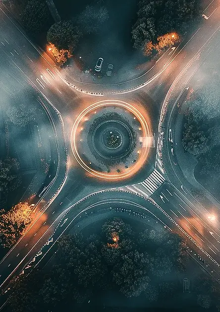 Aerial view of a roundabout in fog, symbolizing strategic decision-making and choosing the right path.