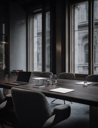 Empty boardroom table representing retained executive search for CEO, Board and C-level appointments across CEE.