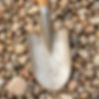 shovel in pebble rocks.jpg