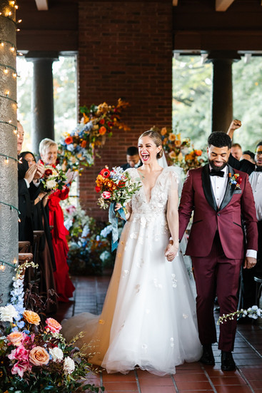 Bride and groom walking down the isle to live music played by Chicago party band