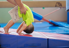 Little toddler boy working out at the in