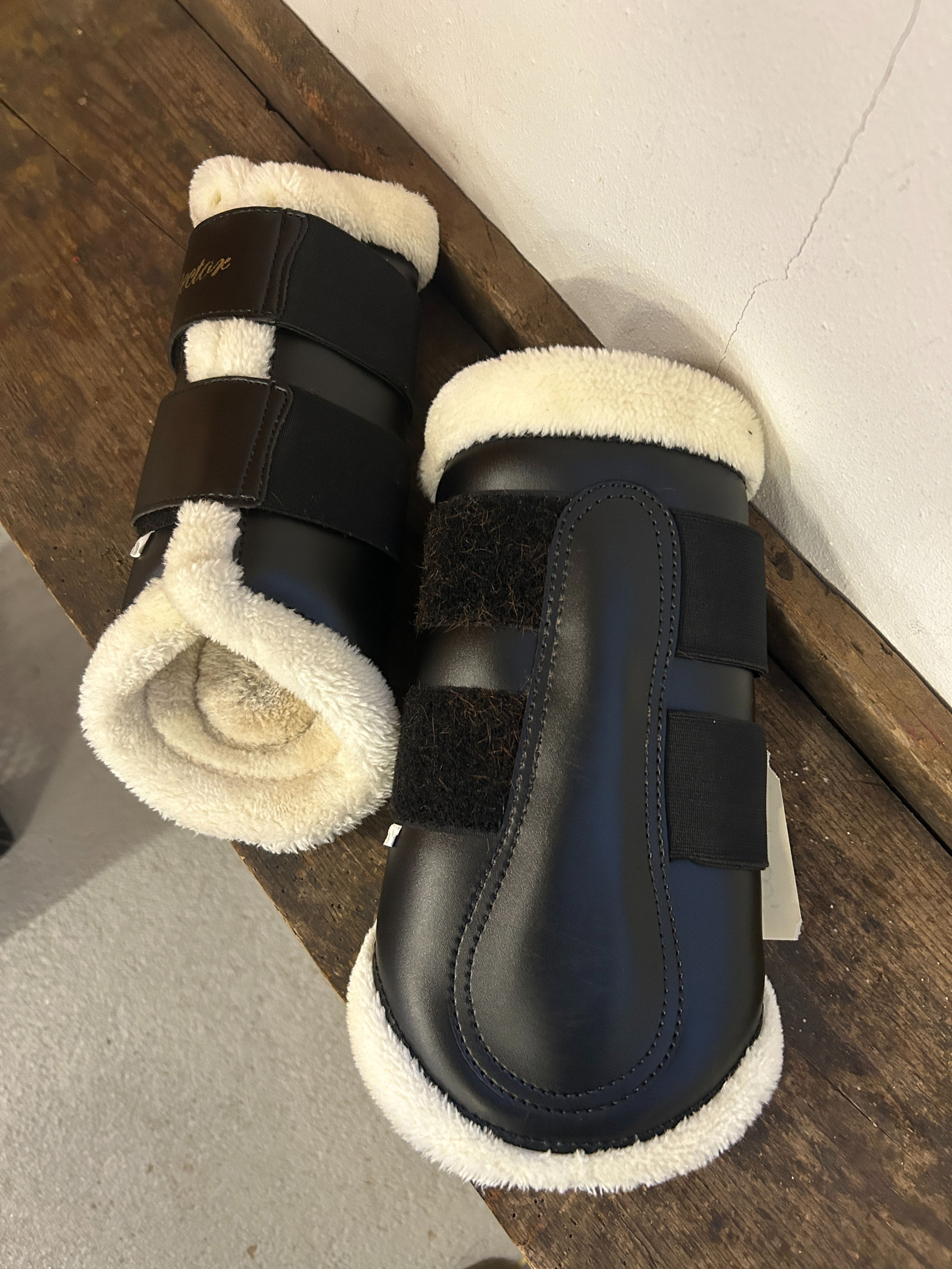 Protector Gamacher i sort, str L