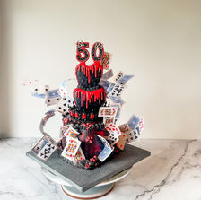 queen of hearts cake with heart shape cake red drip jewels and a crown flying deck of cards for a woman's 50th birthday Sydney cakes Sutherland shire cakes gluten free cake