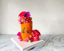bright orange cake with hot pink flowers and gold mirror balls for a woman's 40th birthday Sydney cakes Sutherland shire cakes gluten free cake