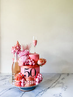 pink bubbles and flower cake