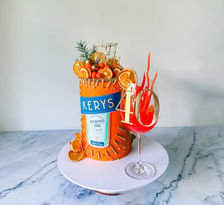 Aperol spritz bright orange cake for a 40th birthday with oranges and gold sprinkles Sydney cakes Sutherland shire cakes gluten free cake