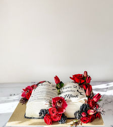 red and black flowers on a book cake with forth wing dragons for a womans 21st birthday Sydney cakes Sutherland shire cakes gluten free cake
