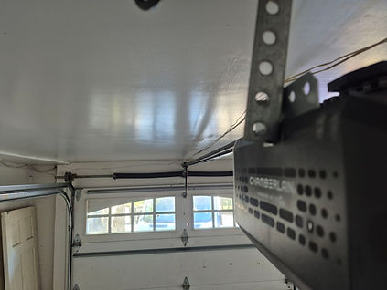 Chamberlain chain drive garage door opener installation in a residential garage