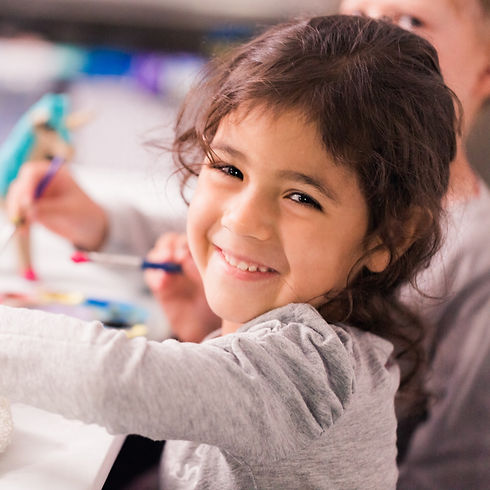 Zoo Crew: Preschool girl working on her art project.