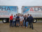 Eye-level view of a moving truck parked outside a house