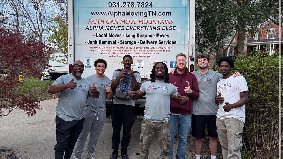Eye-level view of a moving truck parked outside a suburban home in spring