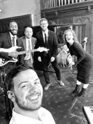 Nathan playing in a wedding band