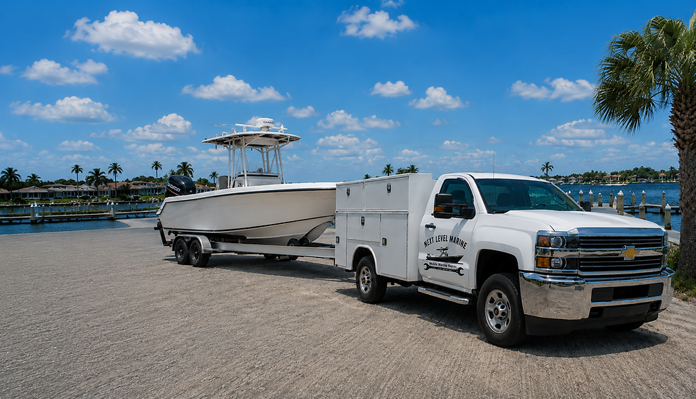 Next Level Marine service truck towing a boat at a dock.