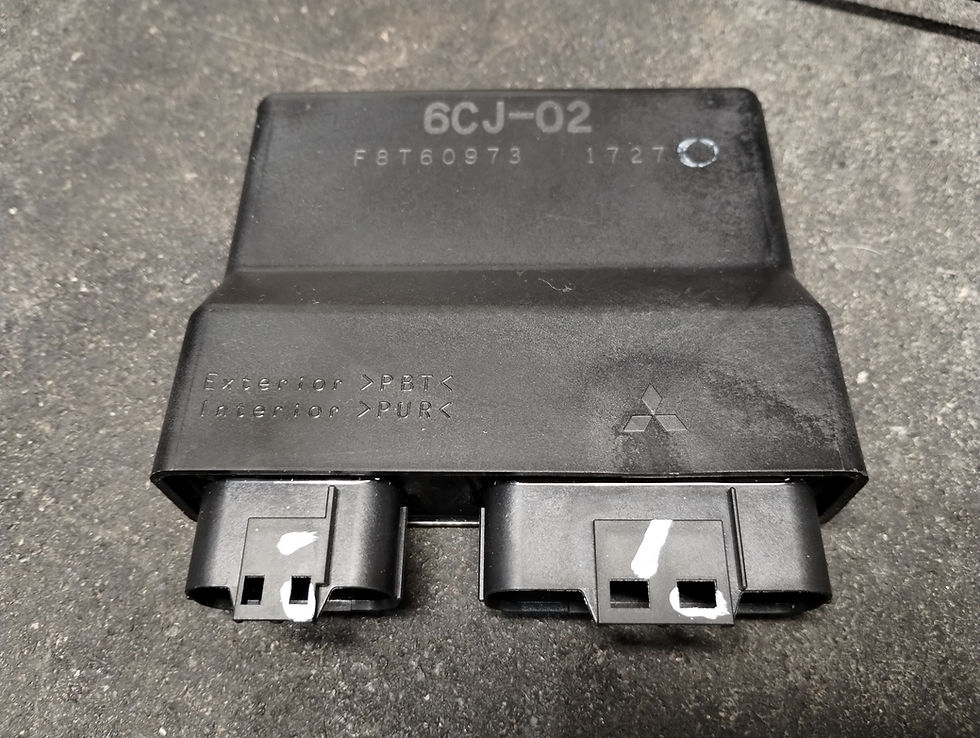 Black Mitsubishi outboard ECU ready to receive it's flash tune