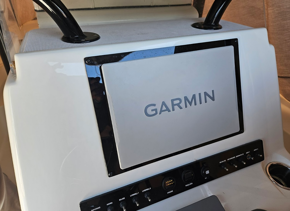 Newly installed Garmin multifunction display mounted at boat helm.