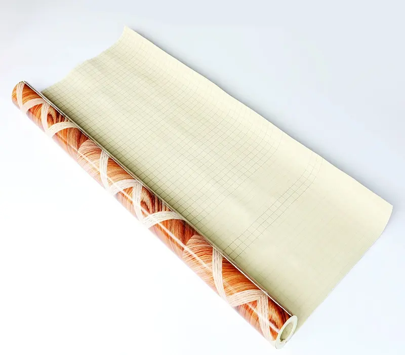 Thumbnail: A stack of rolled beige wood-look PVC flooring, suitable for home or commercial use.