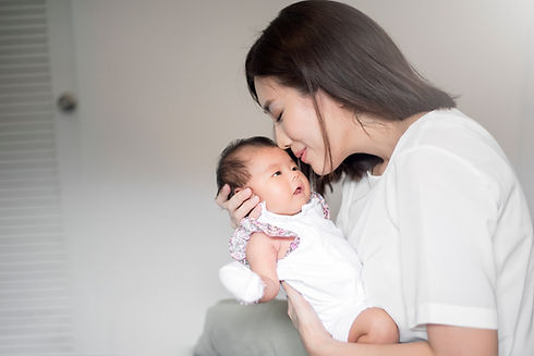 beautiful-woman-holding-newborn-baby-her-arms.jpg