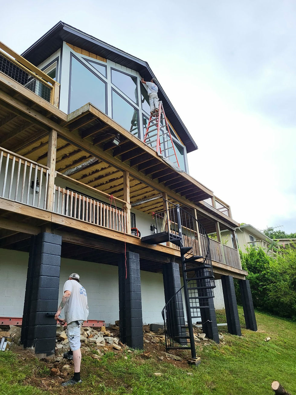 Lofted house with two stories painting posts black.jpeg