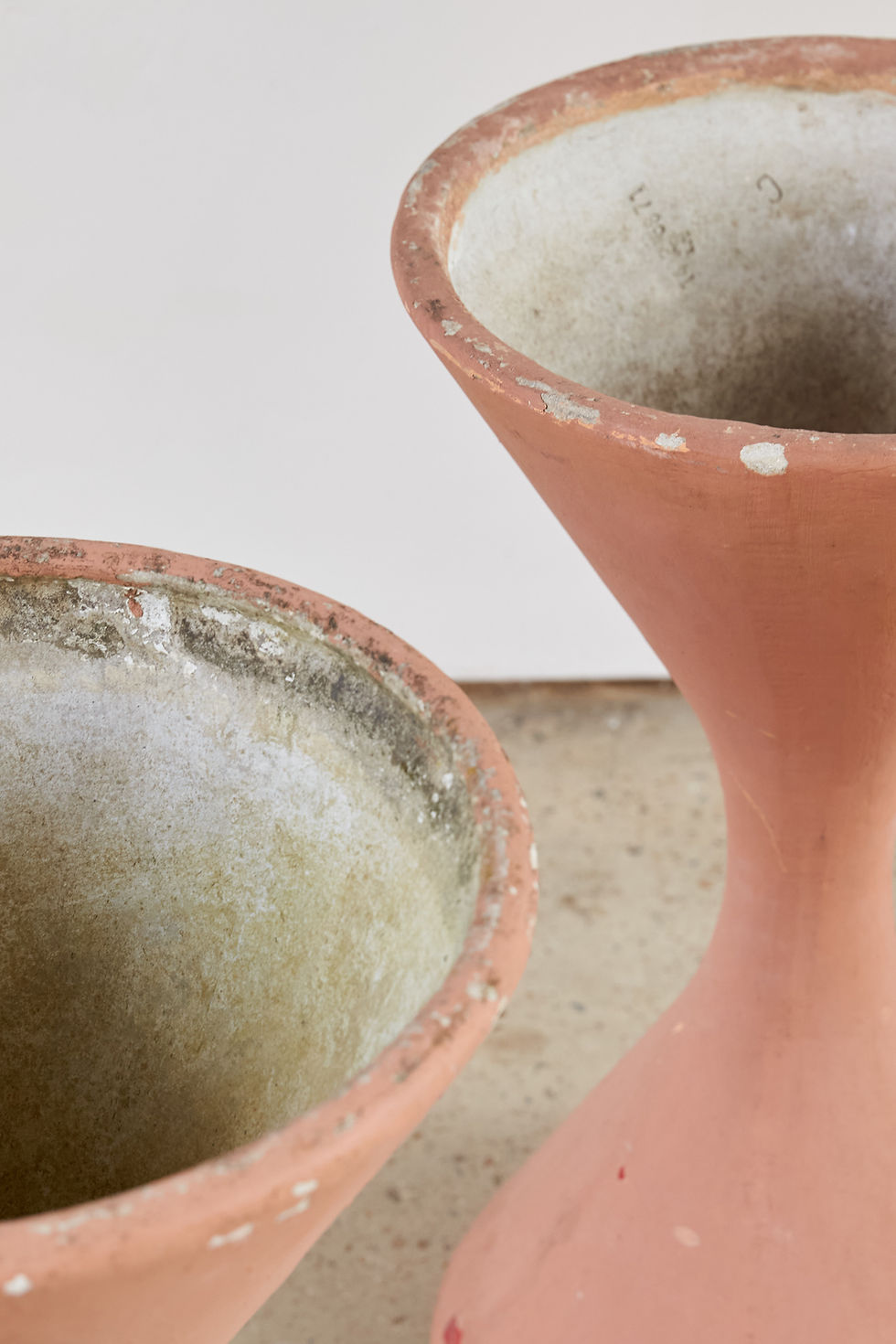 Thumbnail: A pair of Willy Guhl for Eternit 'Diablo' planters, Switzerland, C1970, with a historical terracotta-painted surface.
