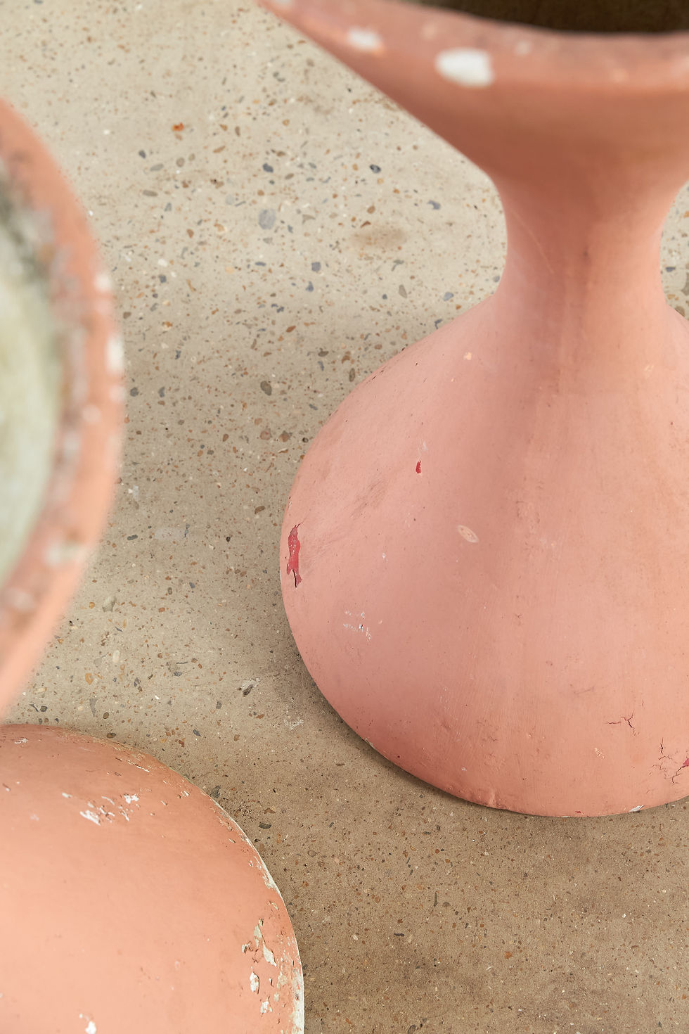 Thumbnail: A pair of Willy Guhl for Eternit 'Diablo' planters, Switzerland, C1970, with a historical terracotta-painted surface.
