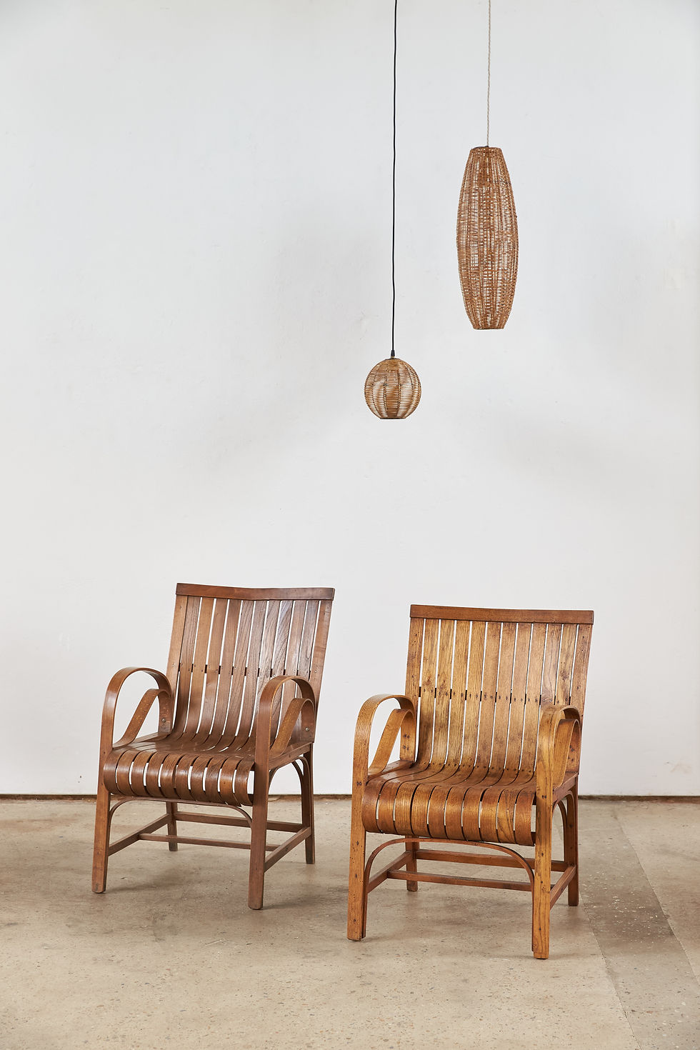 Thumbnail: Italian ceiling pendant lights, crafted from finely woven rattan on a slender metal frame, C1950