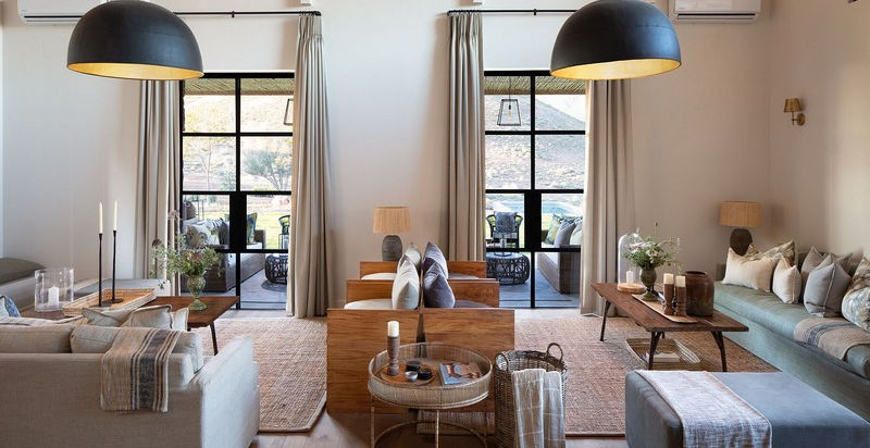 Guest area with sofas and chairs at Cedarberg Ridge Lodge in The Western Cape, South Africa with Safari Ambitions