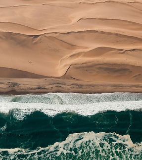 Safari Camps and Lodges in Namibia: Desert Luxury and Wilderness Solitude

Namibia is a country of contrasts — where red dunes meet endless skies, where wildlife roams beneath ancient rock formations, and where silence carries the stories of a land shaped by time. In this stark yet stunning landscape, safari camps and lodges offer travelers a front-row seat to one of Africa’s most surreal and hauntingly beautiful wilderness experiences.

Far from the crowds of more traditional safari destinations, Namibia's lodges and camps invite solitude, reflection, and a deeper connection with nature. Whether you’re tracking desert-adapted elephants, stargazing under crystal-clear skies, or waking to the sound of jackals in the distance, staying in a Namibian safari lodge is about more than just comfort — it’s about immersion.

The Namibian Safari Experience

Unlike the densely populated savannahs of East Africa, Namibia offers vast, open landscapes where animals are spread across wide distances and where the journey often feels just as rewarding as the destination. The safari experience here is slower, more introspective, and often framed by a sense of isolation that heightens every moment of wildlife or landscape encounter.

From the dry riverbeds of Damaraland to the grassy plains of Etosha, Namibia’s ecosystems are diverse — and so too are the camps and lodges that inhabit them.

Types of Safari Camps and Lodges in Namibia
1. Desert Camps

Namibia’s iconic desert regions — including the towering dunes of the Namib and the windswept gravel plains of the Skeleton Coast — are home to minimalist, design-forward camps that blend seamlessly into the environment. These camps are often constructed with eco-conscious materials and offer open-air sleeping platforms, outdoor showers, and sweeping desert views. While wildlife is less concentrated here, sightings of oryx, springbok, and even lions against dune backdrops are unforgettable.

2. Luxury Lodges

Scattered across Namibia’s protected areas and private reserves are upscale lodges that offer sophisticated comfort in remote settings. These lodges typically feature spacious suites or villas with large windows or decks overlooking waterholes, salt pans, or river valleys. Many include swimming pools, wine cellars, and gourmet dining, all set against dramatic natural scenery.

3. Tented Safari Camps

For those seeking a more classic safari ambiance, Namibia offers tented camps that strike a balance between rugged adventure and comfort. These are not basic campsites, but carefully curated spaces with canvas walls, real beds, and en-suite bathrooms. Some are mobile or seasonal, while others are permanent fixtures in the landscape, offering guided game drives, nature walks, and sundowner experiences.

4. Eco-Lodges and Community Camps

Namibia is a leader in community-based conservation, and many of its lodges are owned or operated in partnership with local communities. These camps prioritize sustainability, cultural heritage, and responsible tourism. Visitors often have opportunities to learn about local traditions, participate in conservation programs, or support nearby villages through their stay.

Regional Diversity of Lodging Experiences
Etosha National Park

In and around this vast salt pan ecosystem, lodges range from rustic bush camps to luxurious retreats. Accommodations are often positioned near waterholes, allowing for spectacular wildlife viewing directly from camp. Game drives here offer chances to spot large herds of elephants, rhinos, lions, and antelope against the backdrop of cracked white earth and acacia woodlands.

Damaraland and Kaokoland

These rugged, mountainous regions in the northwest are home to desert-adapted wildlife and ancient rock engravings. Lodges here often emphasize remoteness and cultural integration, with low-impact designs and an emphasis on tracking rare species like black rhinos and elephants. The scenery is breathtaking — stark, silent, and endlessly photogenic.

The Namib Desert

In this region of red dunes and petrified trees, safari camps are often built to take advantage of sunrise and sunset views over the shifting sands. Some offer guided walks to explore desert-adapted flora and fauna, while others provide scenic drives or balloon safaris. Despite the extreme environment, these camps offer exceptional comfort and a deep sense of place.

The Skeleton Coast

Wild and remote, this stretch of Atlantic coastline is defined by fog, shipwrecks, and wind-sculpted dunes. Lodges here are few and far between, making the experience intensely personal and private. Guests can explore dry riverbeds, track elusive wildlife, and discover one of the planet’s last true wildernesses.

The Zambezi Region (Caprivi Strip)

In this narrow strip of fertile, river-fed land in the northeast, lodges are often located along the banks of rivers like the Zambezi and Kwando. This region contrasts sharply with the rest of Namibia, offering lush wetlands, tropical birdlife, and boat-based safaris reminiscent of those in neighboring countries like Botswana.

What to Expect During Your Stay

Intimate Settings: Most camps and lodges are small, often with fewer than 10 rooms or tents, ensuring a quiet and personalized experience.

Scenic Design: Many are architecturally striking, designed to complement the surrounding landscape and maximize views.

Guided Activities: Daily excursions typically include game drives, bush walks, scenic hikes, and cultural visits, led by experienced local guides.

Night Skies: With minimal light pollution, Namibia offers some of the best stargazing on Earth — many camps even provide telescopes or open-air “star beds.”

Sustainability: A strong focus on conservation, water efficiency, and solar power means that your stay often supports the health of the ecosystem you’re exploring.

Choosing the Right Safari Accommodation

When selecting a camp or lodge in Namibia, consider the following:

Location: Each region offers different wildlife and scenery. Your ideal destination may depend on what you're hoping to see and experience.

Style: Do you prefer rustic charm, modern luxury, or a balance of both?

Access: Some remote lodges require charter flights or long drives. Logistics can affect your itinerary and costs.

Activities: Some lodges focus more on wildlife, others on landscapes, culture, or adventure. Choose based on your personal interests.

Final Thoughts

Namibia’s safari camps and lodges are more than places to rest — they are portals into the soul of one of Africa’s most extraordinary countries. Whether set among towering dunes, overlooking ancient dry riverbeds, or hidden deep in rocky hills, these accommodations offer a rare blend of tranquility, luxury, and authenticity.

In Namibia, the experience of where you stay is inseparable from the journey itself. Each campfire under the stars, each panoramic sunrise, each whisper of the desert wind — these are the moments that define a Namibian safari. And they’re waiting just beyond your doorstep.