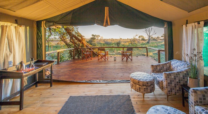 Looking out across The Delta from a guest suite over the deck at Rra Dinare Safari Camp in The Okavango with Safari Ambitions