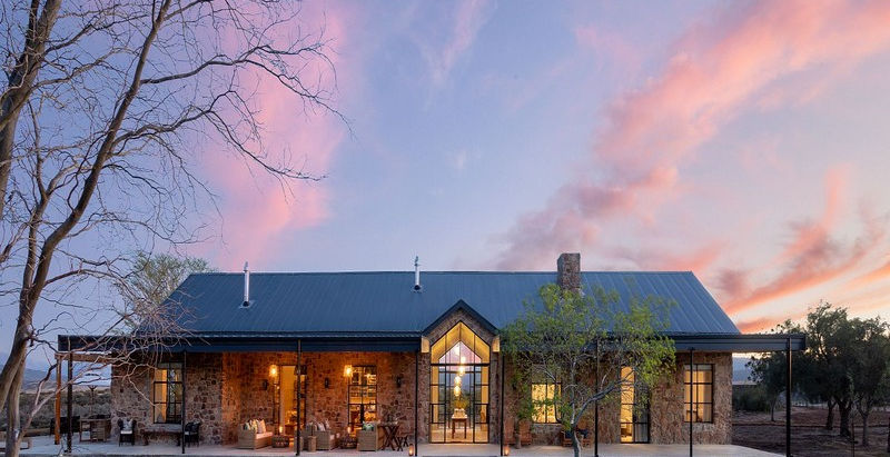 Lodge at Sunset with the deck and garden at Cedarberg Ridge Lodge in The Western Cape, South Africa with Safari Ambitions