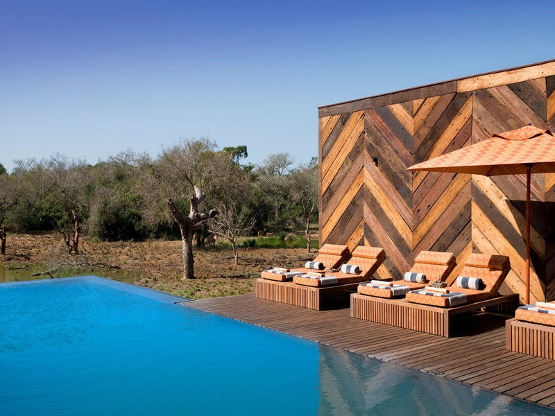 South-Africa-Phinda-Homestead-Guest-area-pool-loungers-2-Low-Resolution-Width=3000px.jpg