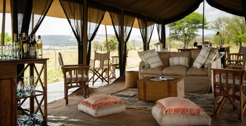 Beautiful guest area with comfortable seating at Serengeti Safari Camp in The Serengeti Tanzania following The Great Migration with Safari Ambitions