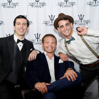 a group of friends at a themed party smile photographer by NYC photographer Askao Imamura, for hire for events and parties