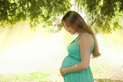 PregnantInGreenDress