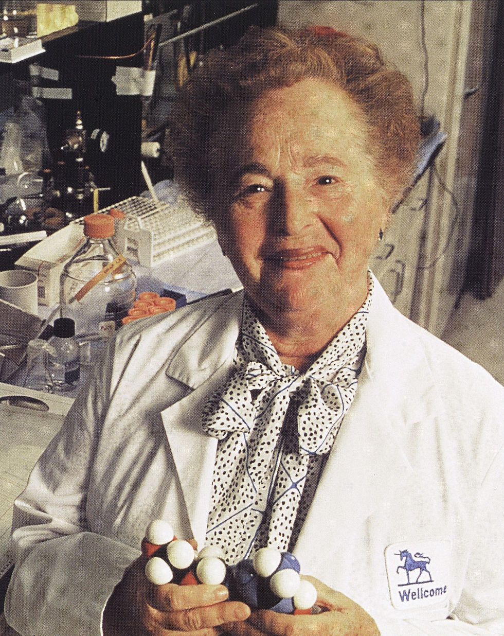 Gertrude Elion in a white lab coat