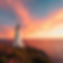 A lighthouse overlooking the sea.jpg