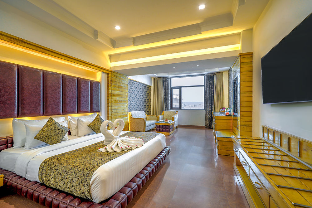 Spacious guest room at a 4 star hotel in Dehradun
