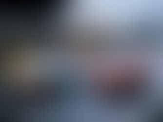 Ford GT40 racing Ferrari head to head at Le Mans in wet, rainy conditions