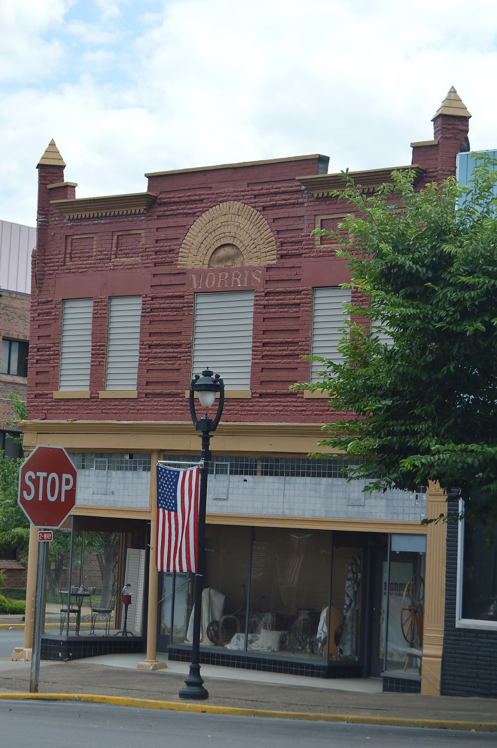 Historic brick storefront of the Morris Building on the public square in Glasgow, Kentucky