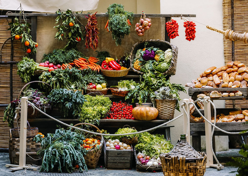 Colorful vegetables arranged at a produce stand; representative market photograph.