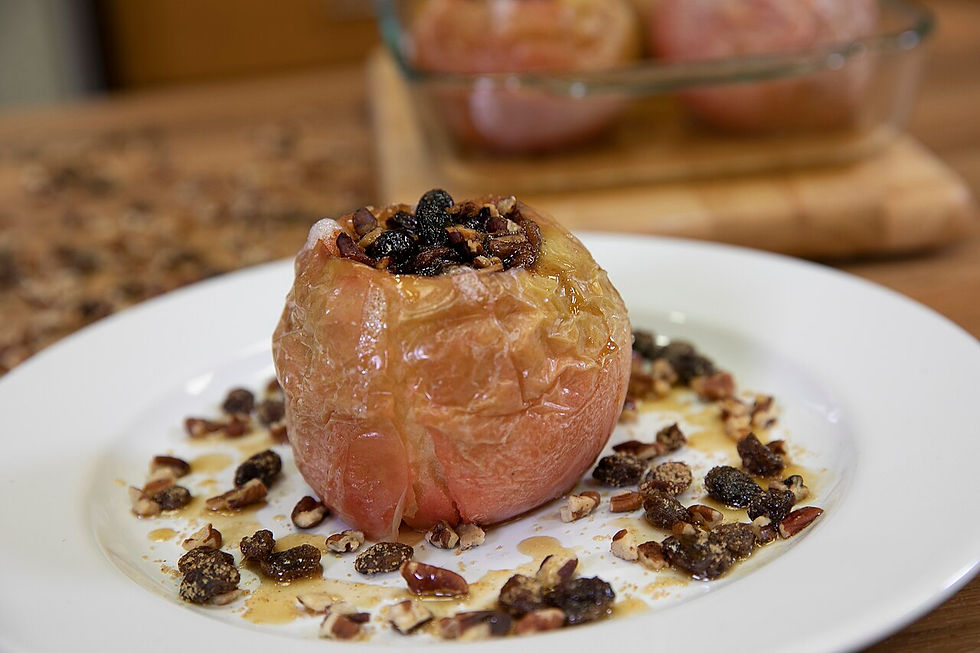 A whole baked apple with a raisin filling.